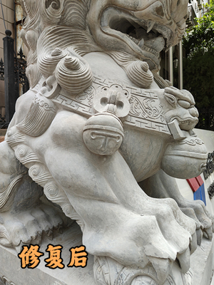 陕建集团大门石狮残缺修复后
