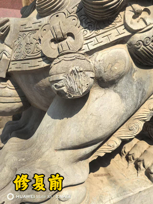 建工集团大门石狮残缺修复前