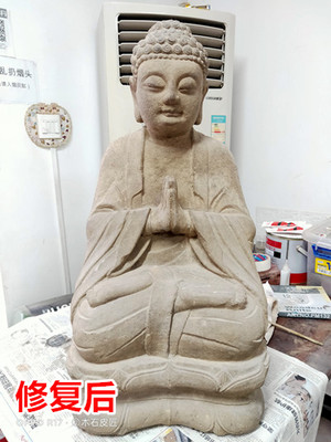石雕佛像破损修复后